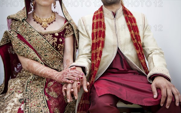 Bride and groom in traditional Indian wedding clothing