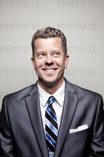 Smiling Caucasian businessman