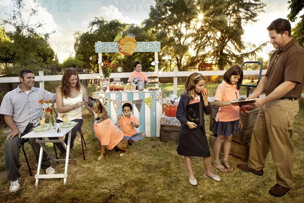 Family relaxing together outdoors