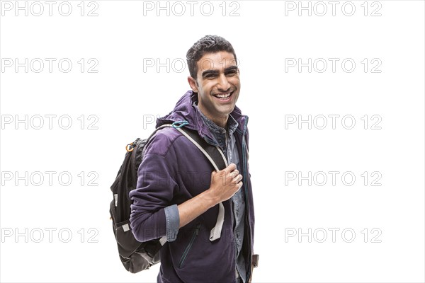 Indian student carrying backpack