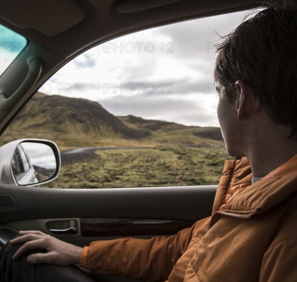 Man driving in remote landscape