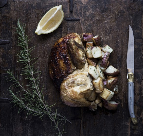 Roasted chicken with potatoes and lemon