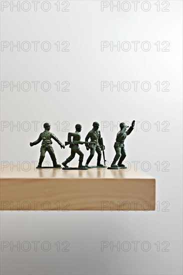 Plastic soldiers on table top