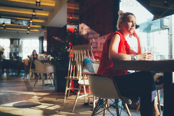 Woman relaxing in cafe