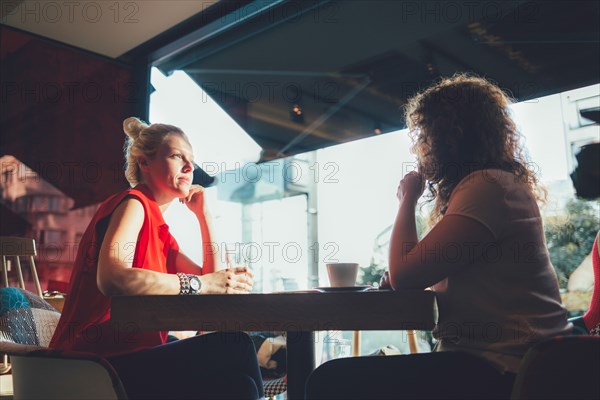 Women relaxing in cafe