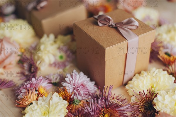 Close up of wrapped gifts and flowers