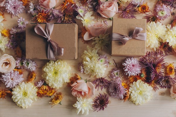 Close up of wrapped gifts and flowers