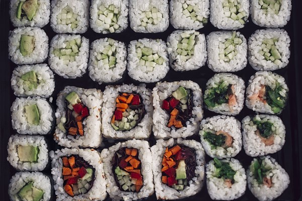 Close up of tray of sushi rolls