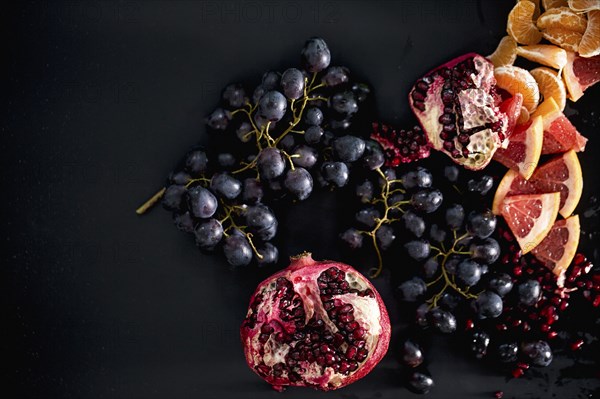 Close up of pomegranates and grapes