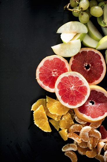 Close up of variety of sliced fruit
