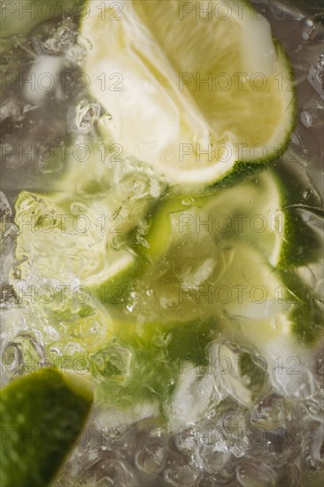 Close up of lime in iced drink