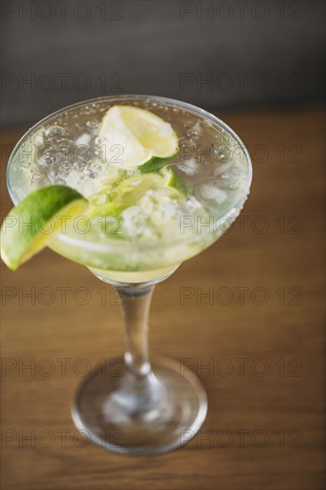 Close up of mojito cocktail drink with lime