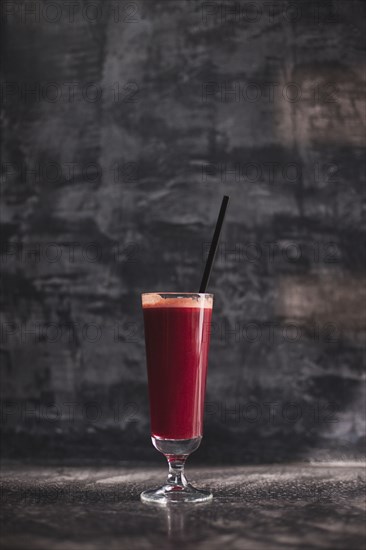 Close up of glass of healthy red juice