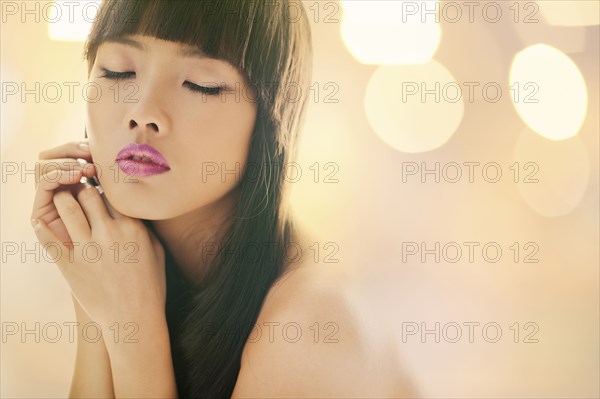 Close up of glamorous woman with eyes closed