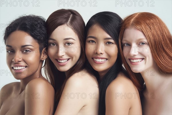 Multi-ethnic nude women posing together