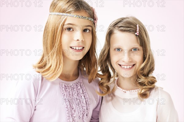 Close up of smiling girls standing