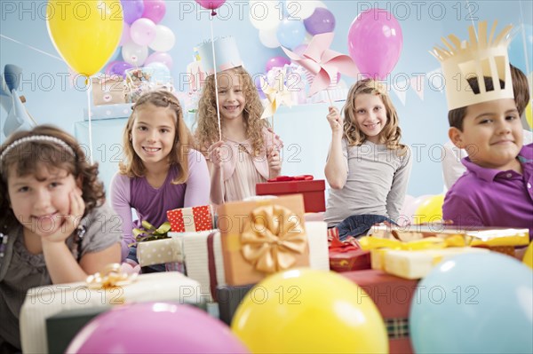 Children smiling at birthday party