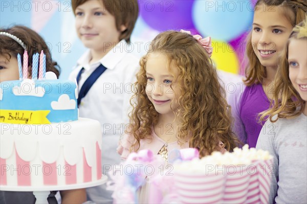 Children smiling at birthday party
