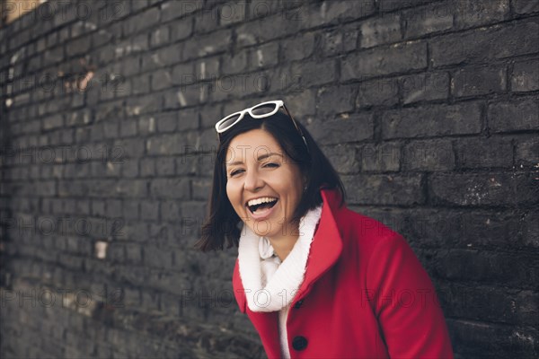 Caucasian woman laughing outdoors