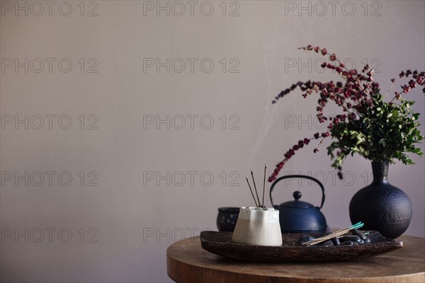 Incense burning on tea tray