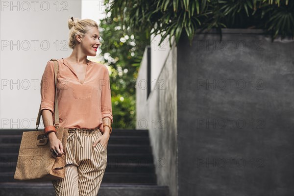 Caucasian woman walking outdoors