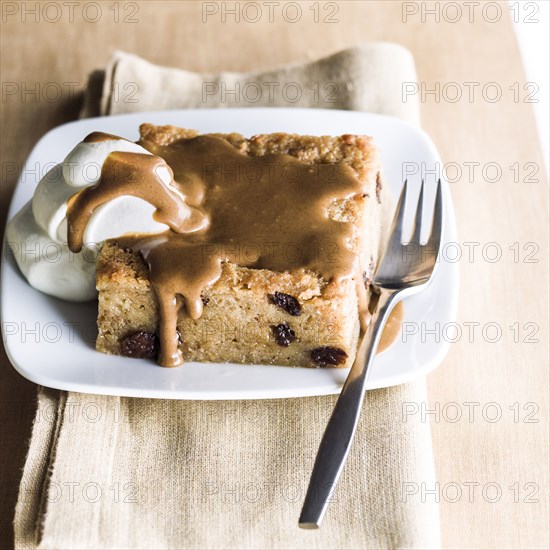 Bread pudding dessert on plate with fork