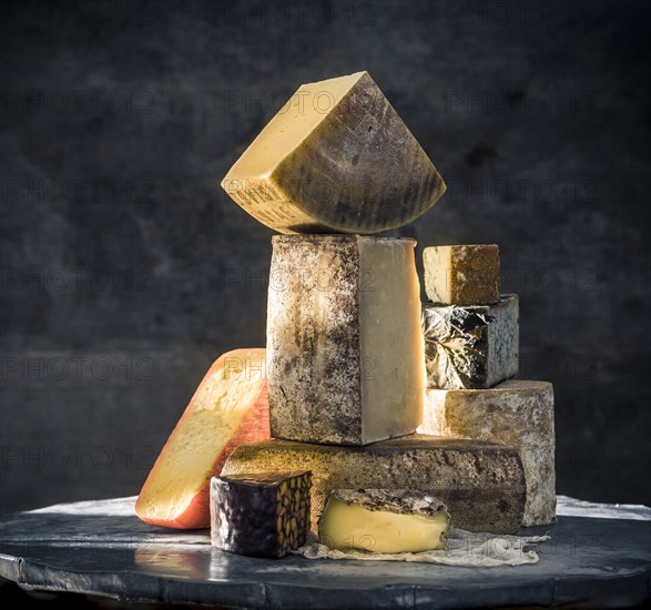 Pile of variety of cheeses