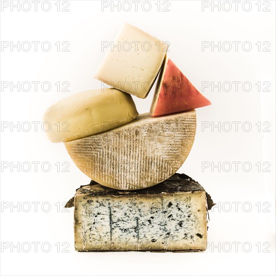 Pile of variety of cheeses