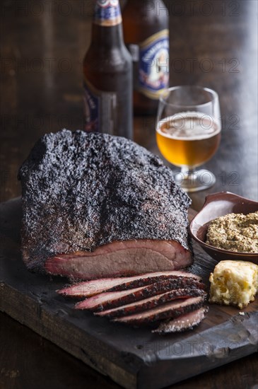 Sliced brisket on cutting board