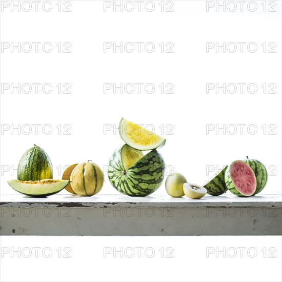 Sliced melons on table