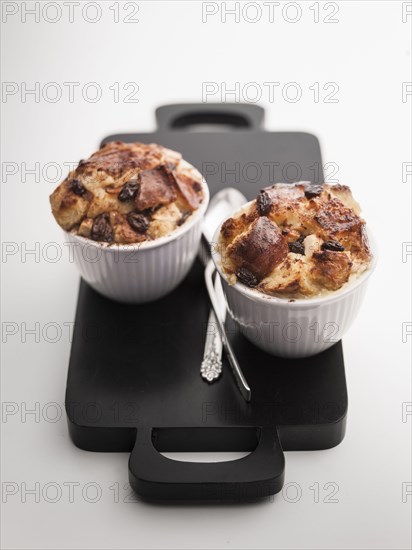 Cups of apple raisin bread pudding