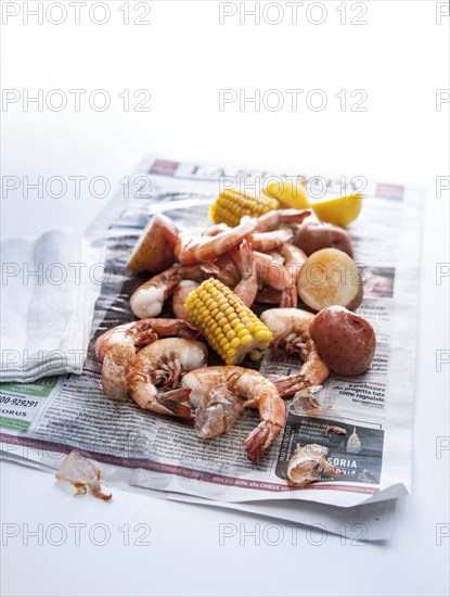 Seafood boil on newspaper