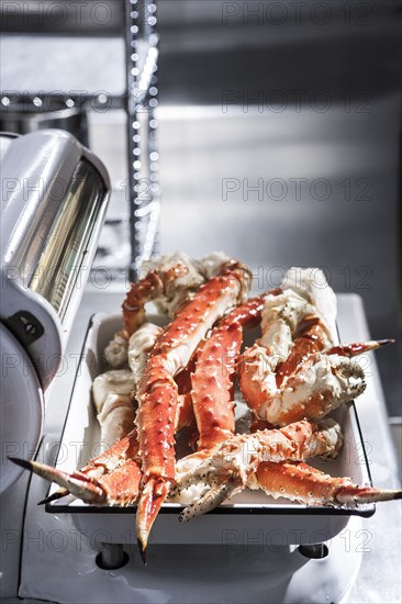 Crab legs on butcher scale