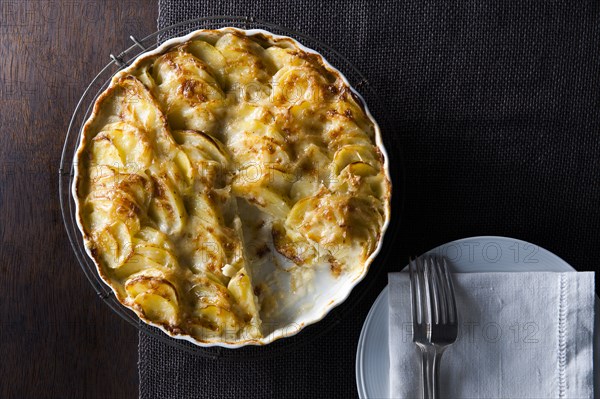 Potato pie on table