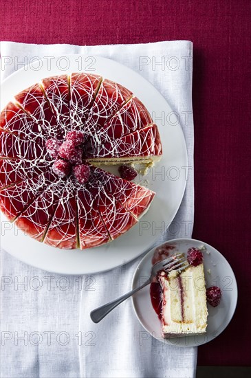 Limoncello raspberry cake on plate and tray