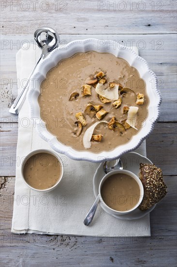 Mushroom soup on wooden table