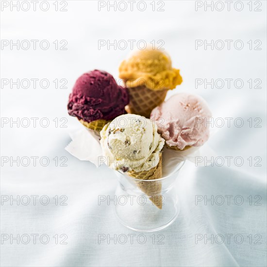 Variety of ice cream cones in glass
