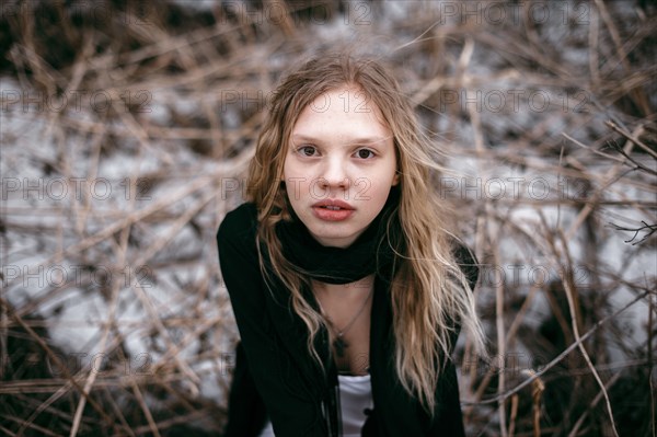 Caucasian woman standing in snow