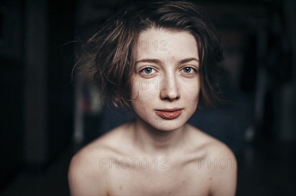 Caucasian woman with bare shoulders