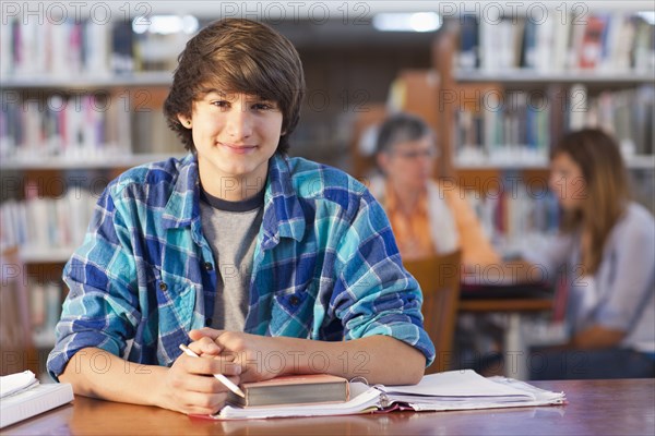 Smiling student in library