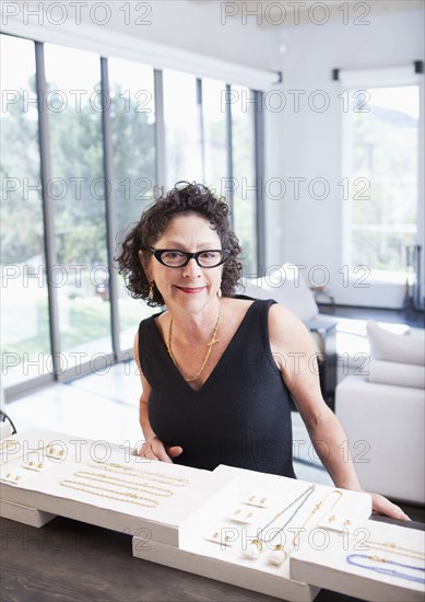 Caucasian woman working in jewelry store