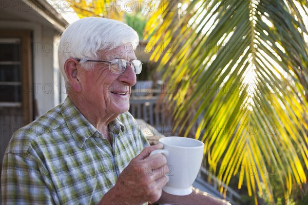 Caucasian man drinking coffee