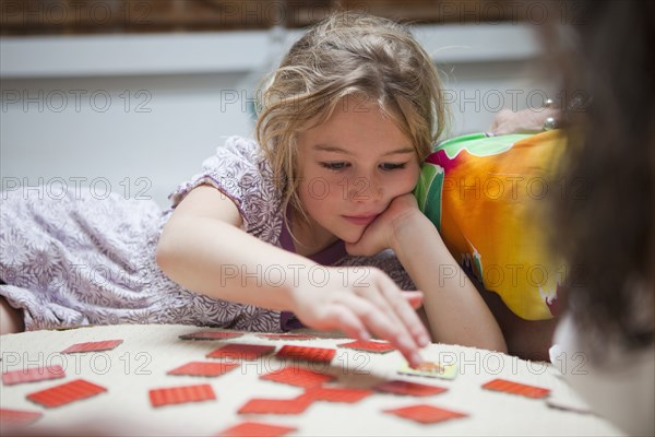 Caucasian girl playing a game