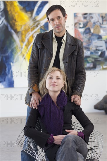 Couple together in art gallery