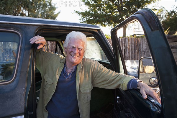 Caucasian man sitting in truck