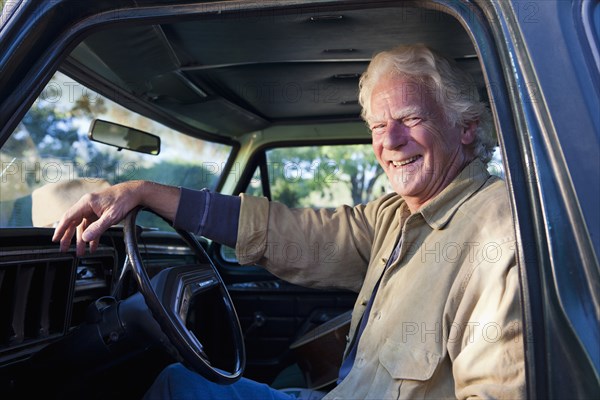 Caucasian man sitting in truck