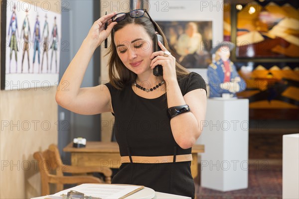 Caucasian woman working in art gallery