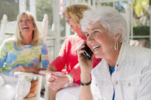 Caucasian woman talking on cell phone