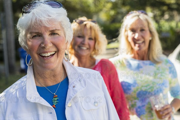 Caucasian women walking on suburban street