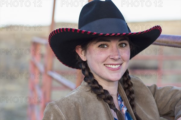Caucasian girl smiling on farm